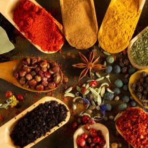 Colorful background from various spices in spoon